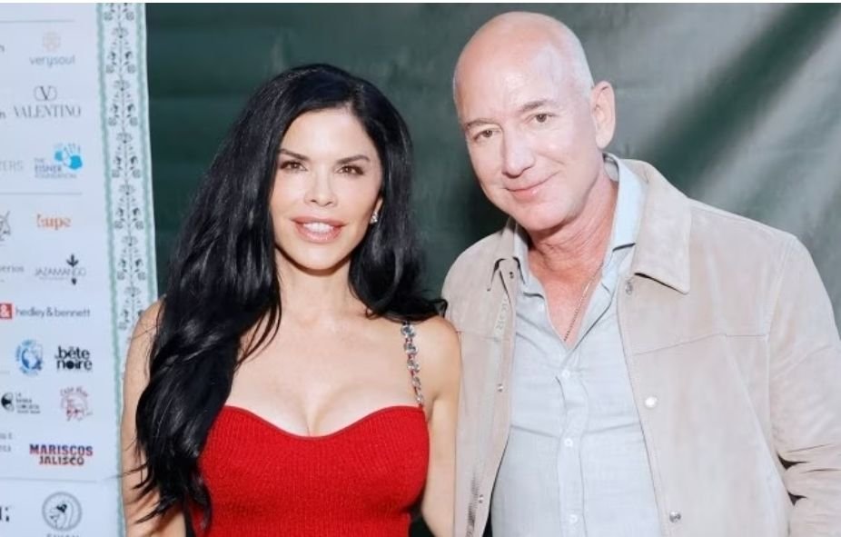 Jeff Bezos Girlfriend attended TIAH's 5th anniversary Soiree in Los Angeles in Red dress